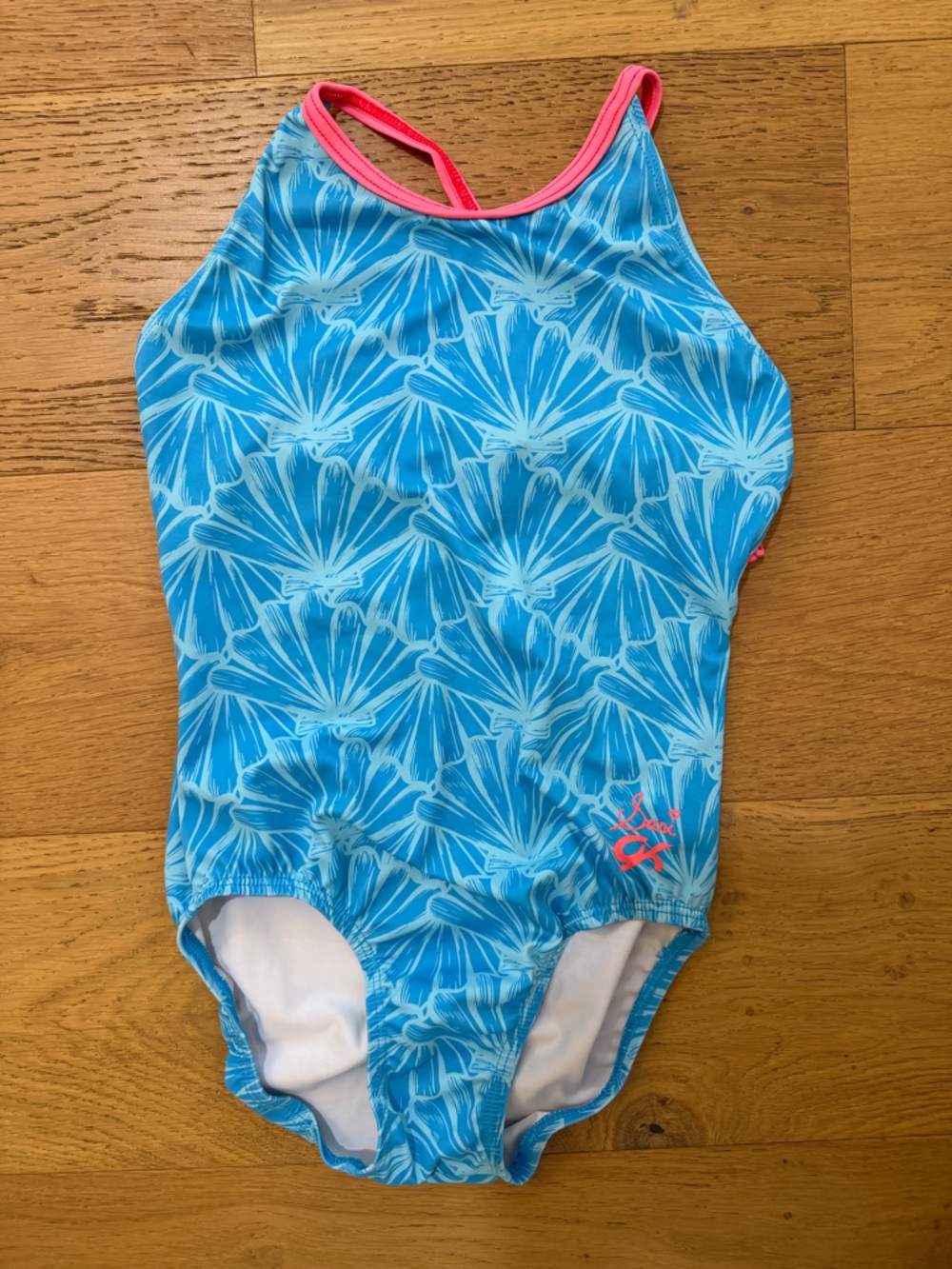GK Blue seashell Suni gymnastics leotard Pink Trim strappy back adult small EUC